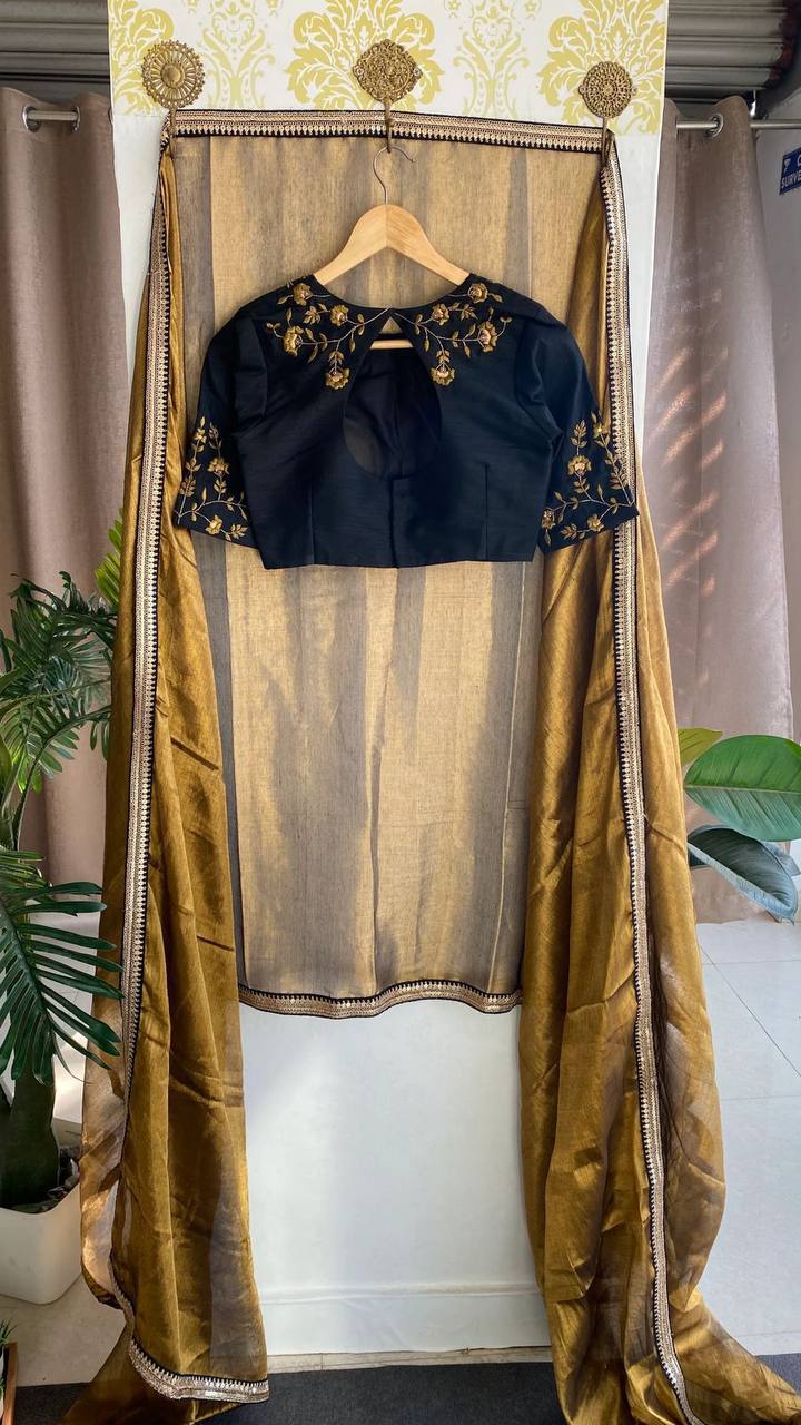 "Elegant Golden Tissue Saree with Lace Border & Embroidered Black Blouse – Festive & Party Wear"